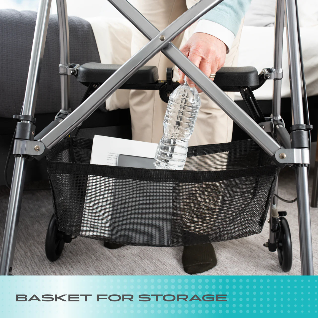 An older adult places a water bottle into the black mesh storage basket attached to the Stander Wonder Rollator Plus. "BASKET FOR STORAGE" appears at the bottom of the image.