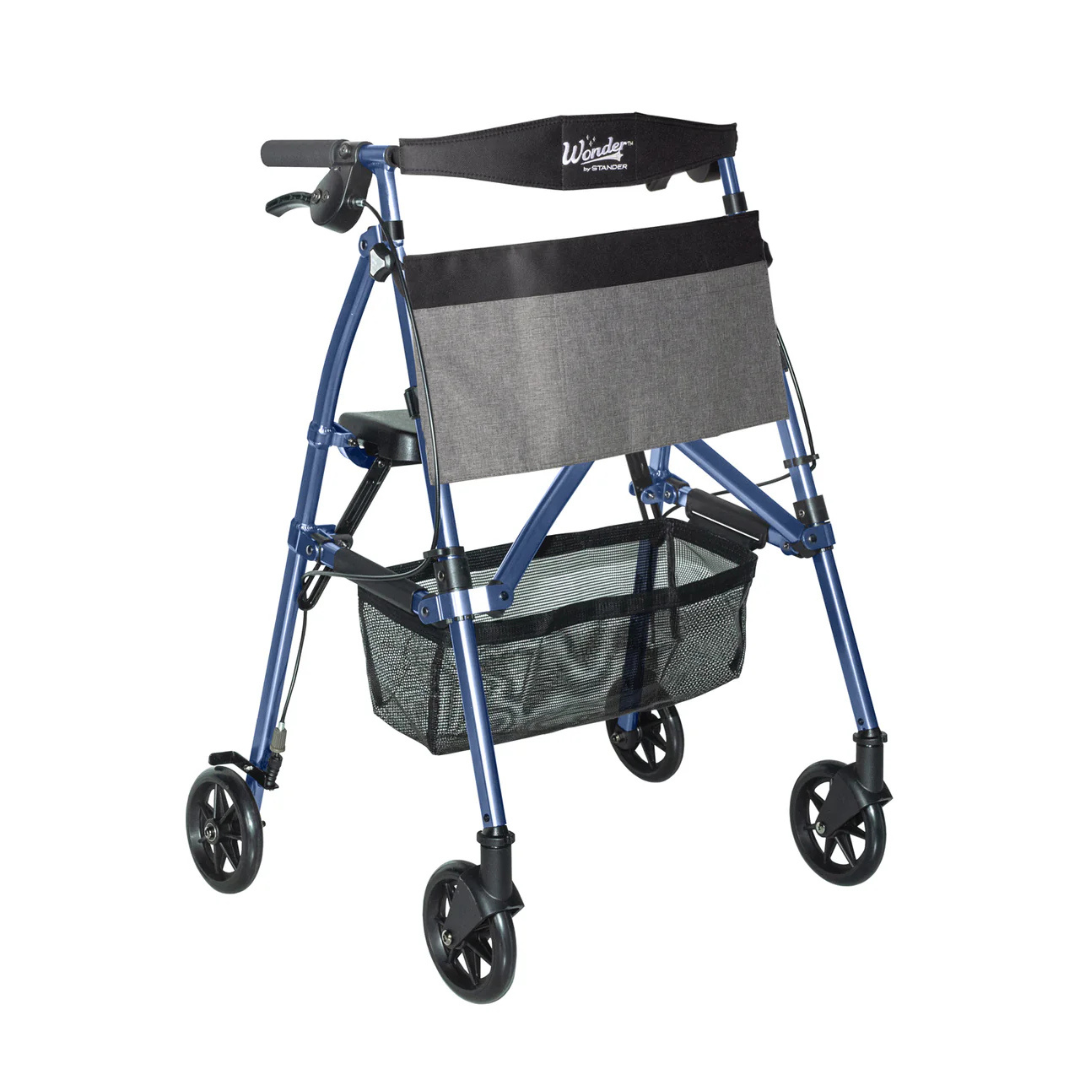 The Stander Wonder Rollator Plus is a blue compact folding walker with four black wheels, ergonomic handles, hand brakes, a built-in seat with backrest, gray front pouch, and mesh storage basket for easy travel and convenience.