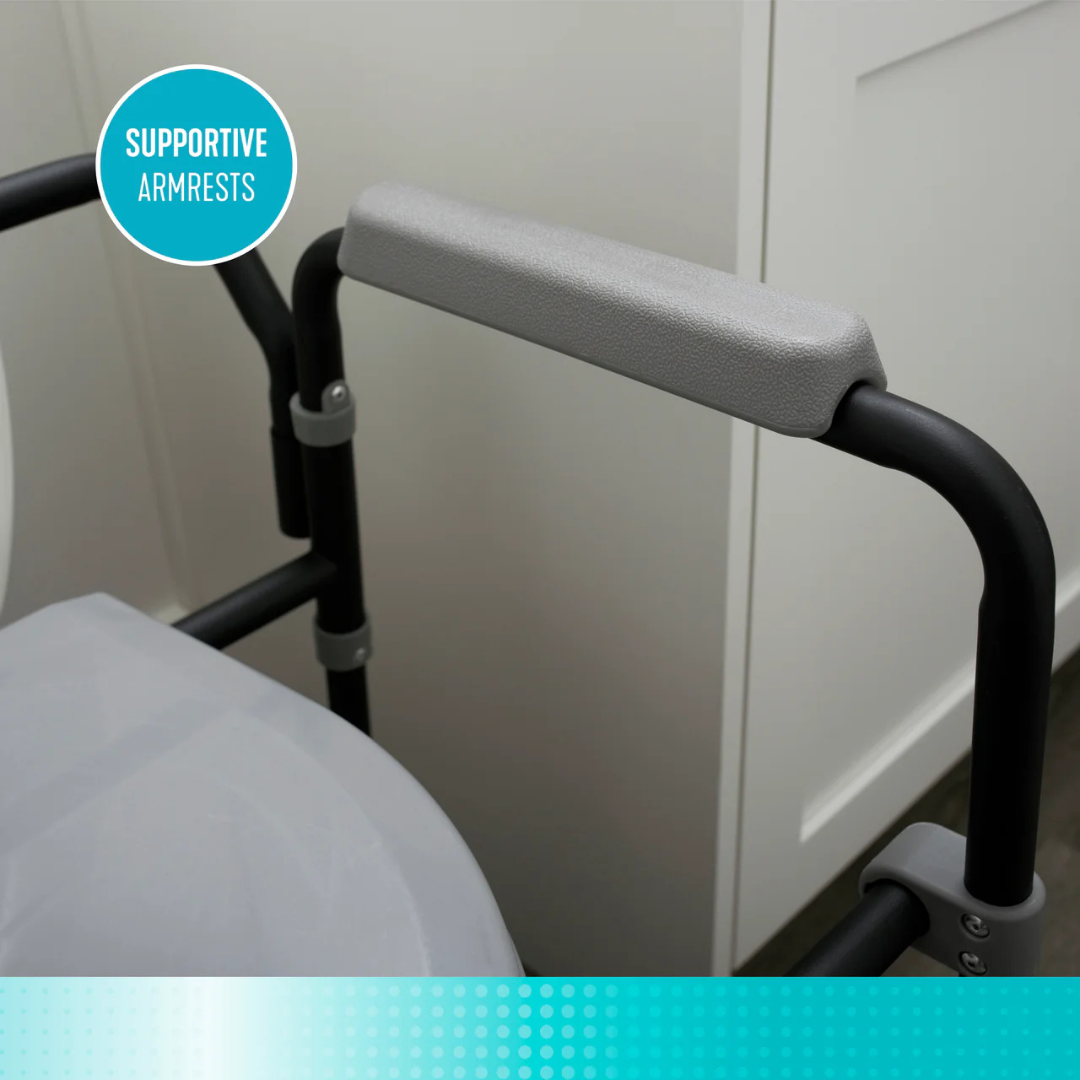 A close-up of the gray and black supportive armrest on the Stander Universal Bedside Commode with TP Holder, featuring a teal circle labeled "Supportive Armrests." Part of a white cabinet and seat appear in the background.