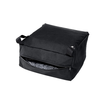 A Storage Bag For ScootNgo Lite/Voyager in black fabric features two sturdy handles and a zippered front pocket, shown partially open to reveal the interior. Ideal for carrying your daily essentials on your Voyager Mobility Scooter, the bag is displayed against a plain white background.