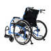 The Strongback Mobility 24HD Heavy Duty Wheelchair is shown against a white background. It features a blue frame, large rear wheels, black cushioning, visible handles and footrests. The angled view highlights its lightweight build and ergonomic design.