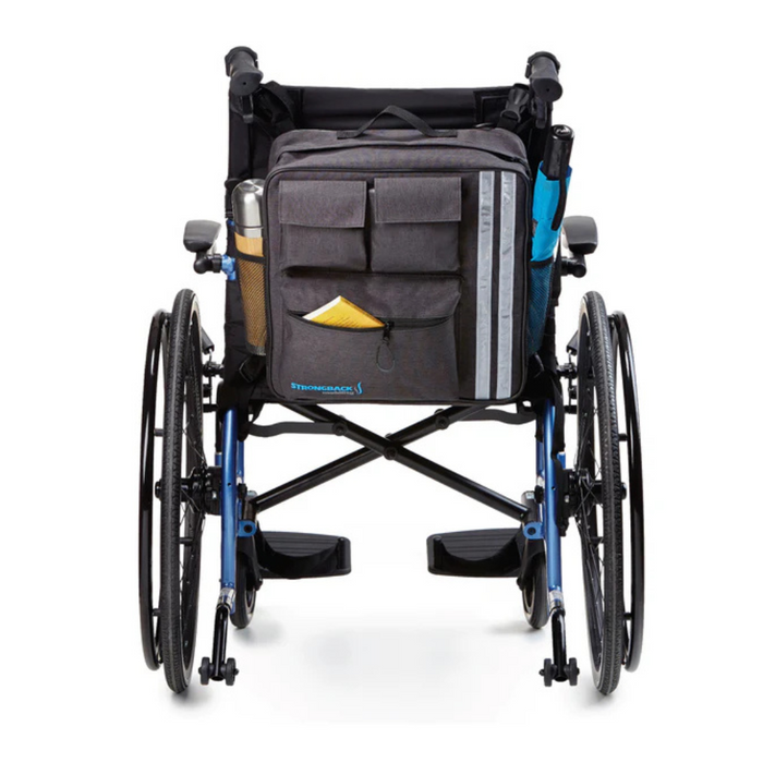 A durable blue wheelchair with a Strongback Mobility Accessories backpack attached, featuring multiple pockets including one with a yellow envelope. A water bottle is in the side pocket and an umbrella is strapped on the other for enhanced convenience.