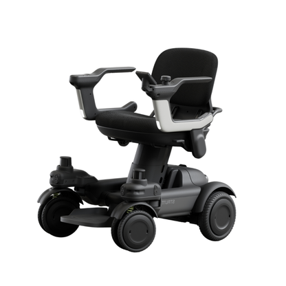 Introducing the STRUTT Electric Vehicle ev1 – a sleek, black four-wheeled mobility scooter featuring armrests and a comfortable seat for enhanced personal transportation and accessibility. Designed with guided sensors to help you drive smarter, this product is not a medical device; please consult the specifications for further details.