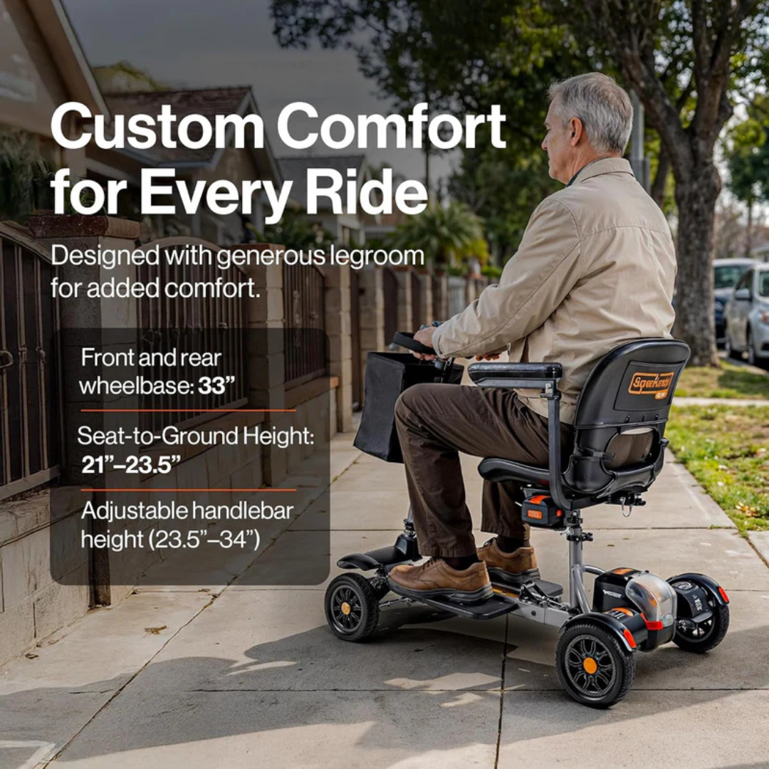 An older man rides a SuperHandy Passport Flex 4 Wheel Power Mobility Scooter on a sidewalk, enjoying comfort, generous legroom, a 33" wheelbase, 21–23.5" seat-to-ground height, and adjustable handlebars from 23.5–34".