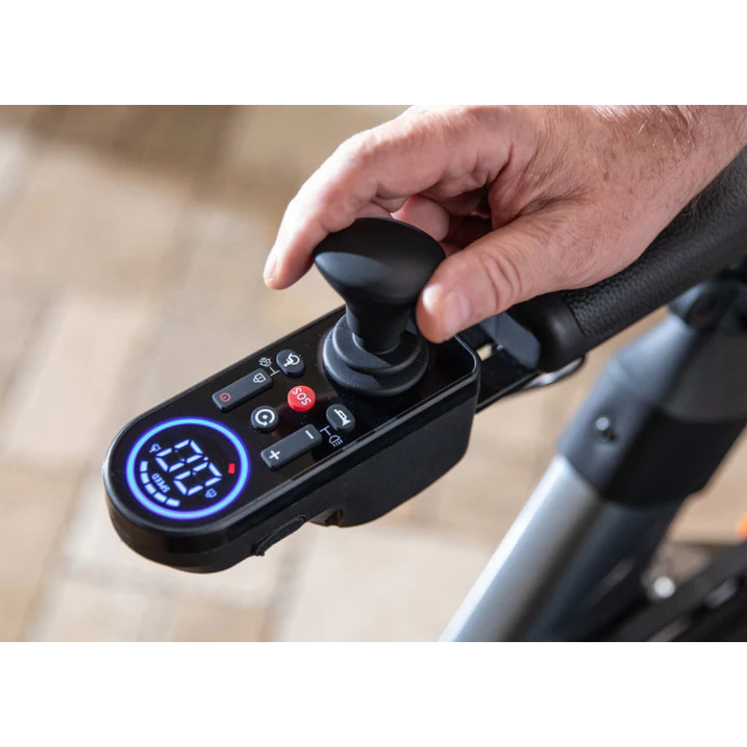 A close-up of a hand using the joystick and control panel on the Superpi W1 Electric Wheelchair Rollator with 4-in-1 functionality, showing multiple buttons and illuminated indicators.