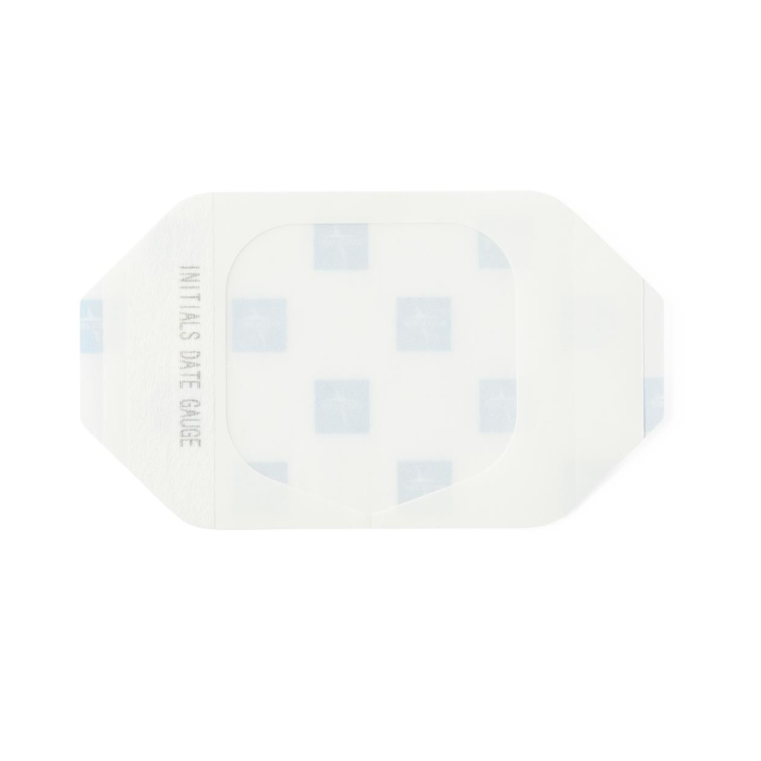 Medline SureSite Window Transparent Film Dressing is a clear IV insertion dressing with a white backing and blue squares, plus a left-side area for writing initials and date, providing dependable catheter site protection.