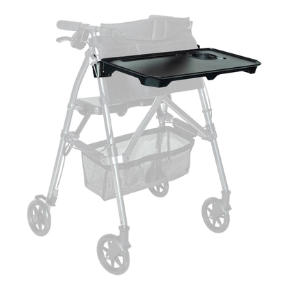 The Tray Accessory For Stander Walkers & Rollators, featuring a cup holder, is shown mounted on the handles of a silver four-wheeled walker with a mesh basket. The tray is highlighted while the rollator appears faded in the background.