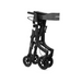 The Triumph Mobility Essentials Compact Lightweight Rollator is a black folding walker with four wheels, ergonomic handles, and a gray fabric strap for easy carrying. It offers a compact mobility solution.