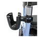 The Triumph Mobility Accessory for Escape Rollators showcases a close-up of a black plastic cup holder on a light blue walker, featuring a gray fastening mechanism and black velcro strap, seamlessly integrated as an accessory.