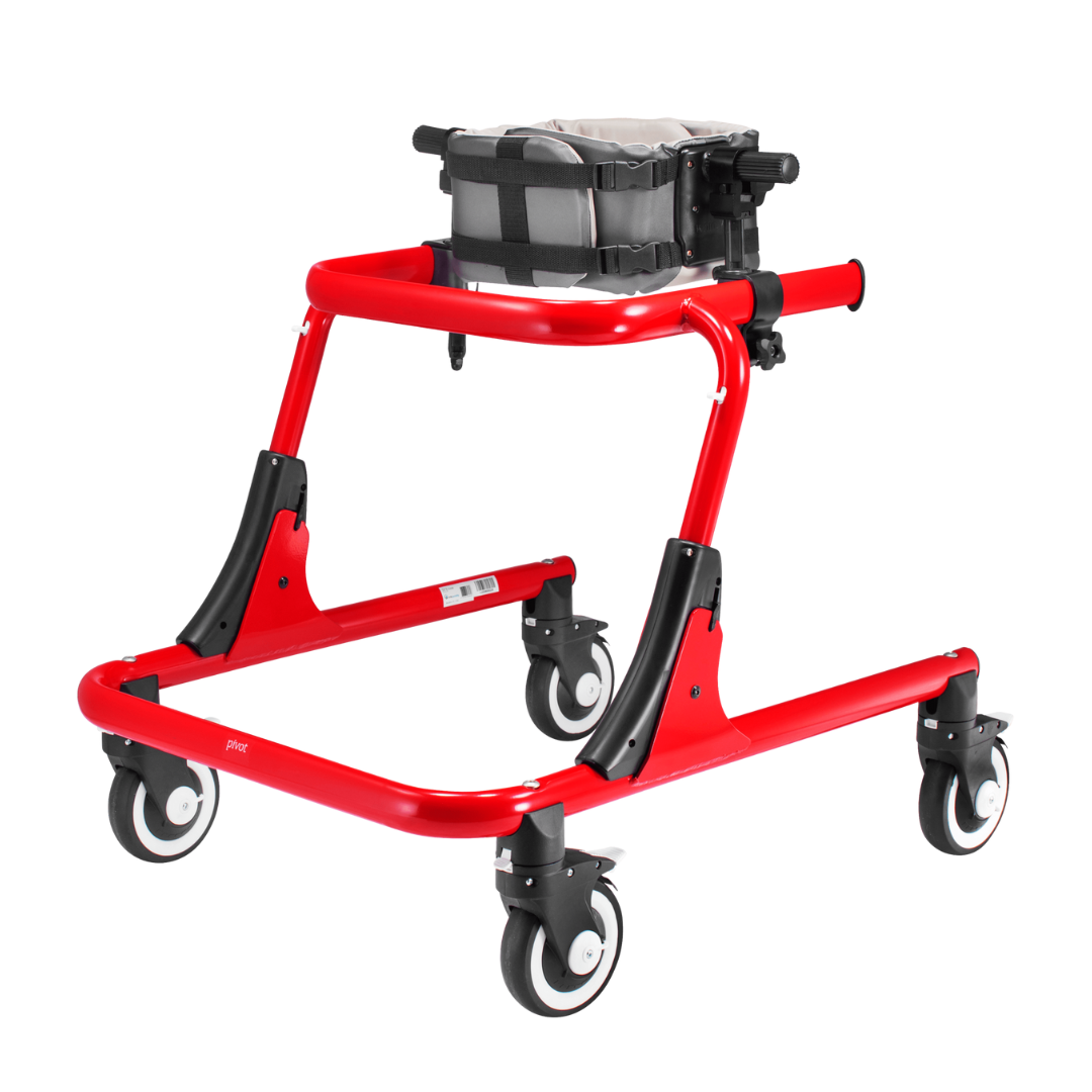 The Trunk Support For Pivot Gait Trainer is a red pediatric mobility aid with four black-and-white wheels and a gray cushioned harness for trunk support, offering sturdy upper-body stability for mobility assistance.