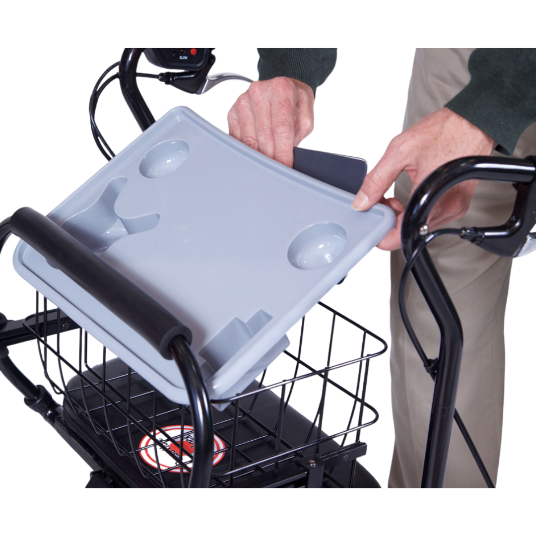 A person places the gray In-Step Home Caddy Kit with cup holders onto the black basket attached to the U-Step Walker frame.