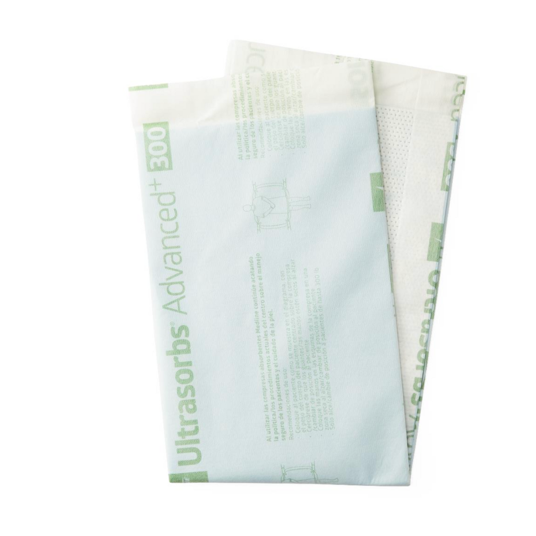 Two light green, rectangular Medline Ultrasorbs Advanced+ Premium Underpads, partially overlapping, display printed instructions and diagrams. Designed for patient care, they feature a superabsorbent polymer core.