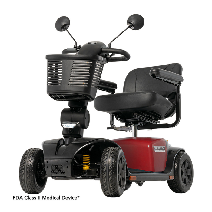 The Pride Mobility Victory® Platinum Bariatric 4-Wheel Scooter features a red base, black seat with armrests, front basket, rearview mirrors, Charge360 Magnetic Charging, and is an FDA Class II medical device.