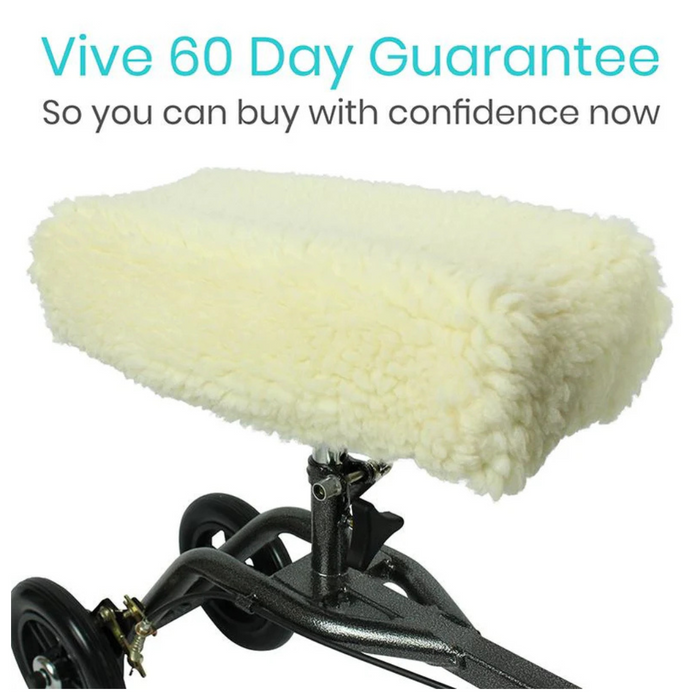 Close-up of the Vive Health Faux Sheepskin Knee Walker Pad Cover on a knee walker, featuring plush comfort and a nonslip design. Accompanied by small black wheels for reliable mobility assistance, it comes with a Vive 60 Day Guarantee so you can buy with confidence.