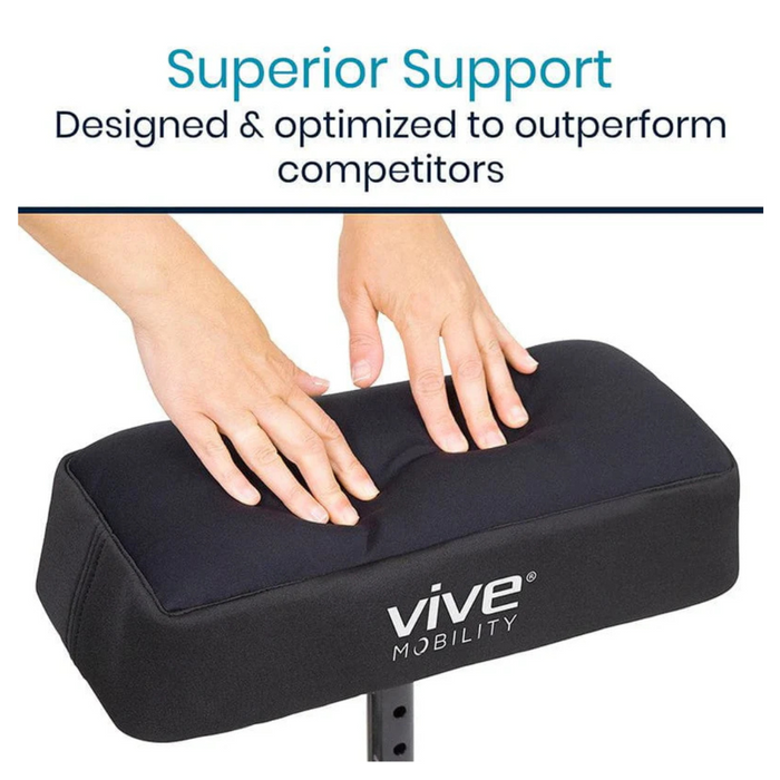 Two hands press on a black Vive Health Memory Foam Knee Walker Pad, showing its superior support. With a non-slip exterior for stability and memory foam for unmatched comfort, its designed to outperform competitors.