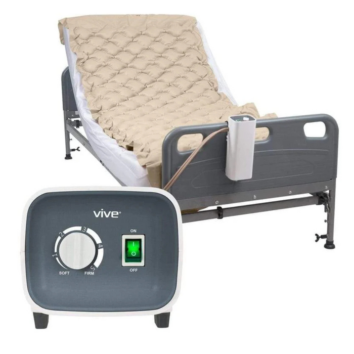 The Vive Health Alternating Pressure Pad, an inflatable hospital bed with a pressure relief mattress, features a control panel with a dial and on/off switch. It has a raised backrest, adjustable pressure pump, and sturdy metal frame.