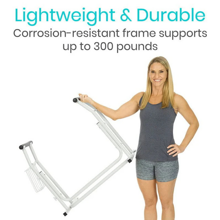 A woman in athletic wear stands beside a Vive Health Stand Alone Toilet Safety Rail, demonstrating its tool-free assembly. This lightweight, portable rail boasts a corrosion-resistant frame and supports up to 300 pounds.