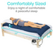 A woman rests on the Vive Health 5 Alternating Pressure Pad—Bedsore Prevention, sized at 77x34x5 inches. Covered in a blue blanket and white sheets, the mattress offers adjustable firmness with alternating air chambers for personalized comfort. Text reads Comfortably Sized.