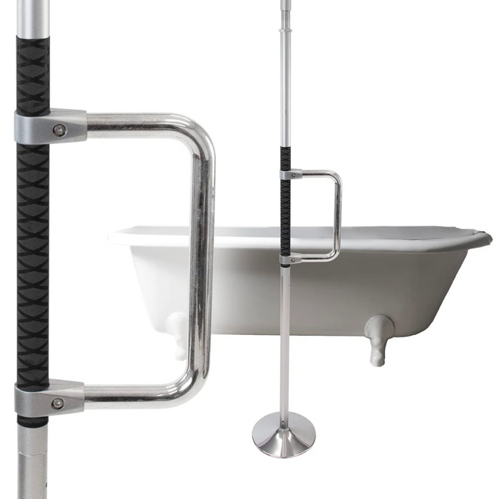 The Vive Health Floor to Ceiling Grab Bar, designed for fall prevention and as a standing aid, stands beside a clawfoot bathtub. It features durable construction with non-slip rubber grips and a circular base for stability, highlighting its use for support and safety.