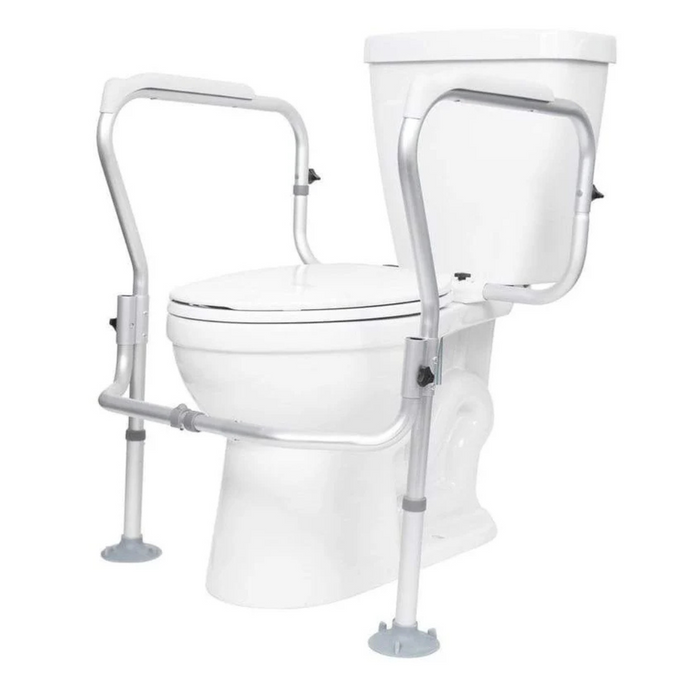 The Vive Health Toilet Safety Frame with Suction Grip Feet is a white toilet accessory featuring non-slip handrails and four legs with suction grip feet for stability, providing tool-free installation to assist individuals with mobility challenges.