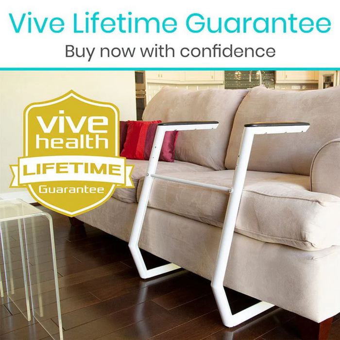 A beige sofa paired with a Vive Health Stand Alone Rail set on the floor, showcasing its durable steel frame and comfy handrails. The image features a Vive Lifetime Guarantee badge for confident purchasing.