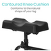 A black contoured knee cushion with leg-shaped indentations on a support stand, ideal for the Vive Health Folding Portable Knee Walker. Text above reads, Contoured Knee Cushion: Conforms to the natural shape of your leg.