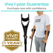 A person using black Vive Health Forearm Crutches, lightweight and height adjustable, stands wearing a white vive health t-shirt. The image showcases a 1 Year Guarantee badge with the phrase Purchase now with confidence.