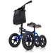 The Vive Health All Terrain Knee Walker features a padded black knee rest, handlebar, hand brake, detachable black storage bag, and four XL 12 all-terrain tires. This crutch alternative aids mobility for individuals with leg injuries.