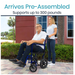 A man relaxes in a Vive Health Lightweight Steel Folding Transport Wheelchair, pushed by a casually dressed woman. They enjoy a sunny day outdoors, surrounded by greenery and buildings. The text reads, Arrives Pre-Assembled, Supports up to 300 pounds.