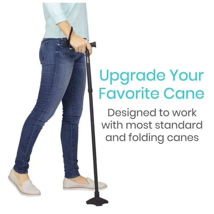 A person in jeans and a light blue shirt holds a black cane with a flexible quad tip. Text reads, Upgrade Your Favorite Cane: Designed to work with most standard and folding canes—Vive Health Standing Cane Tip converts your cane into a stand-alone cane.