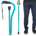 A person holds the Vive Health Folding Offset Cane, a bright blue height-adjustable cane with a black grip and wrist strap. The unfolded cane beside them ensures a secure footing with its non-slip design, while the user wears dark pants and black shoes.