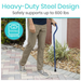 A person walks on a stone path with the Vive Health Offset Bariatric Cane, which features a blue grip. Text reads Heavy-Duty Steel Design and highlights its nonslip feature and 600 lbs capacity, supported by a circular graphic stating 600lbs Capacity.