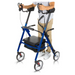 A person in a white shirt and beige pants uses the Vive Health Upright Rolling Walker Rollator—Tall & Bariatric. The blue walker features customizable handrails, hand brakes, four wheels, a foldable design, and a storage compartment under the seat. Only their torso and hands are visible.