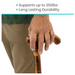 A person using the Vive Health Wooden Cane with an ergonomic handle, designed for long-lasting durability and strong enough to support up to 250 lbs, ensuring reliable use for years.