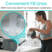In a kitchen, a woman pours water into the Vive Health Ice Therapy Machine. An inset shows fill lines and a low ice alert indicator for optimal cold therapy. Text at the top reads, Convenient Fill Lines and Low ice alert to maximize coldness.