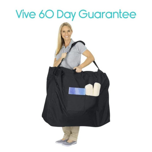 A person with a Vive Health Mobility Travel Bag - XL, featuring pockets, holds rolled towels and a blue mat. Text reads Vive 60 Day Guarantee. Perfect for travel, theyre wearing a gray shirt and beige pants while smiling at the camera.