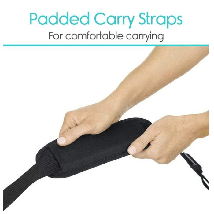 A close-up shows hands holding the Vive Health Mobility Travel Bags black padded carry strap, highlighting its comfortable design and travel-friendly features. Text above reads, Padded Carry Straps for Comfortable Carrying, ideal for your XL storage bag with handles.