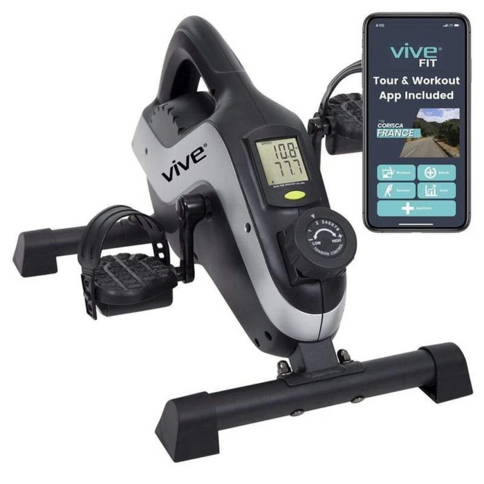 The Vive Health Smart Magnetic Pedal Exerciser is a black and silver portable device with magnetic resistance. It features pedal straps, a digital display, and a compact under-desk design, compatible with a smartphone app for workout programs. The Vive brand is prominently displayed.