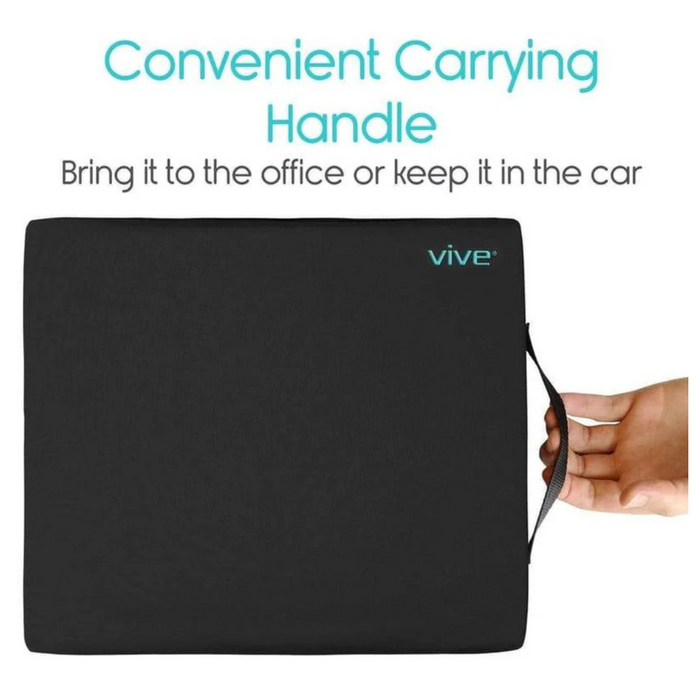 The Vive Health Wheelchair Gel Seat Cushion features an ergonomic black design with a convenient carrying handle, premium foam for comfort, and visible brand name “vive.” Ideal for tailbone pain relief, its perfect for the office or car.