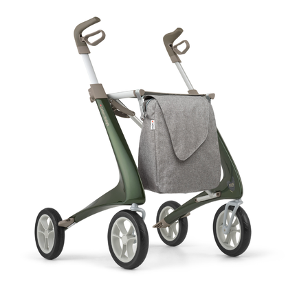 The Weekend Bag is a large gray fabric accessory designed for ByAcre Carbon Fiber Rollators, attaching easily to the frame—see the spec-table for more details.