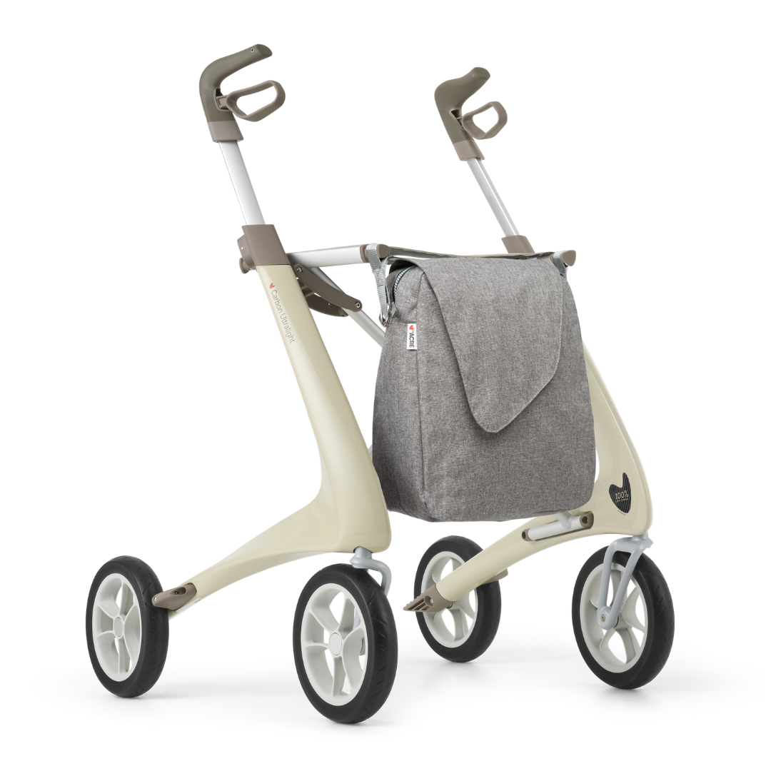 The Weekend Bag for ByAcre Carbon Fiber Rollators is a stylish, lightweight gray fabric accessory designed for optimal mobility, easily attaching to your modern rollator to provide convenient storage and enhance everyday use.