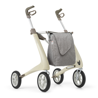 The Weekend Bag for ByAcre Carbon Fiber Rollators is a stylish, lightweight gray fabric accessory designed for optimal mobility, easily attaching to your modern rollator to provide convenient storage and enhance everyday use.