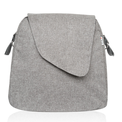 A Weekend Bag for ByAcre Carbon Fiber Rollators, made of gray fabric with an asymmetrical front flap and side straps, is displayed upright against a white background, reflecting sleek modern table design elements.