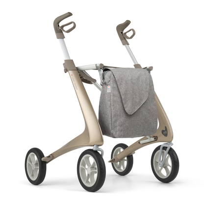 A stylish gray weekend bag designed for ByAcre carbon fiber rollators, providing practical, spacious storage while complementing the modern look of your mobility aid.