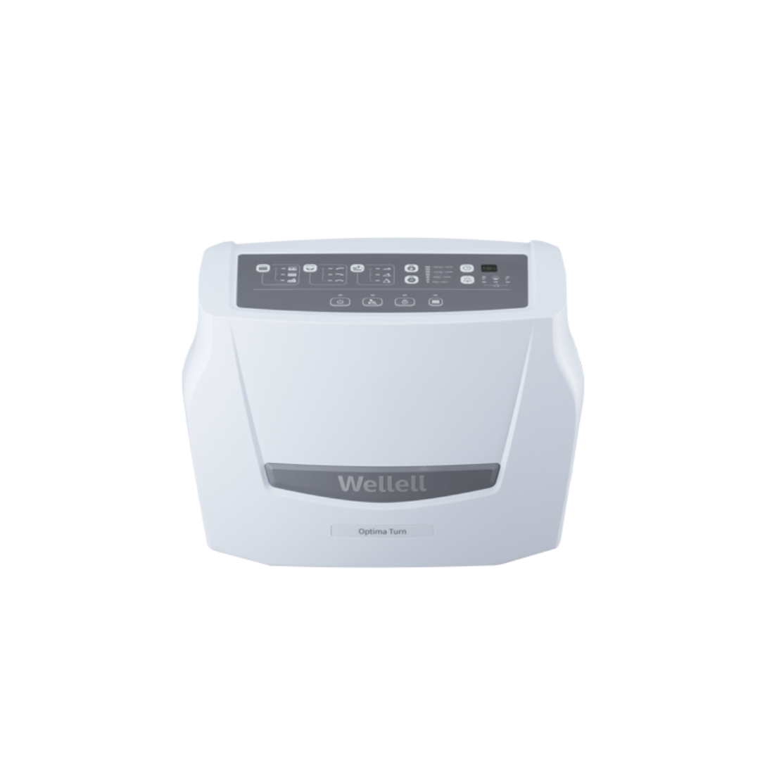 The Wellell Optima Turn Automated Lateral Rotational Pressure Relief System is a white device with a gray control panel featuring buttons and indicators, providing automated lateral rotation for improved pressure injury prevention.