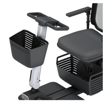 Close-up of the Front Basket for WHILL Model R scooters, highlighting its spacious design and compatibility with the Model R’s handlebar and seat. The sleek black basket is a versatile storage accessory for your modern mobility scooter.