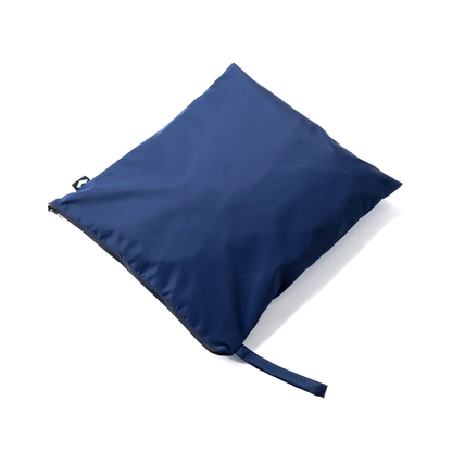 A navy blue, rectangular zippered pouch with a small loop handle, designed to store the Waterproof Cover for WHILL Model C2 Power Chairs, lies flat on a white background.