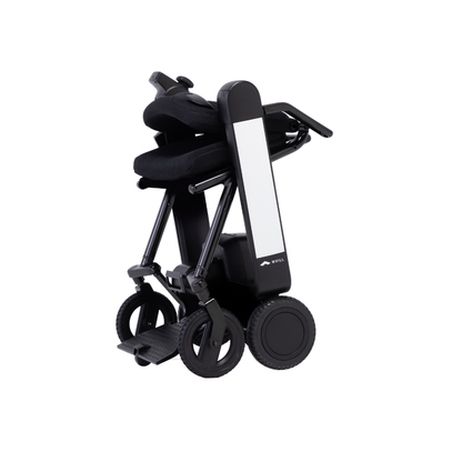 The Whill Model F Lightweight Portable Electric Wheelchair features a modern black design, folds upright for easy storage and transport, and has large wheels. Check specifications and warranty details for added peace of mind.