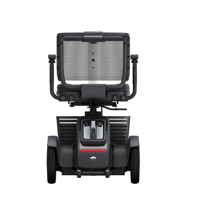 A rear view of the Whill Model R 4 Wheel Portable Scooter shows its large rear wheels, mesh backrest, and adjustable armrests against a white background—ideal for improving accessibility and mobility.
