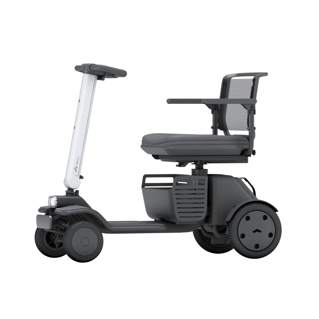 The Whill Model R 4 Wheel Portable Scooter is shown from the side on a white background, featuring modern design with armrests, a mesh backrest, and a sturdy platform.